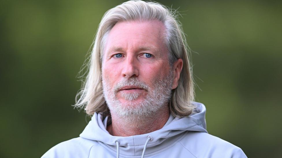 Forest Green boss Savage 'miles away' from managing Wales