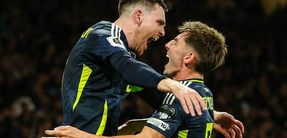 Does Gilmour have to start in Scotland midfield?
