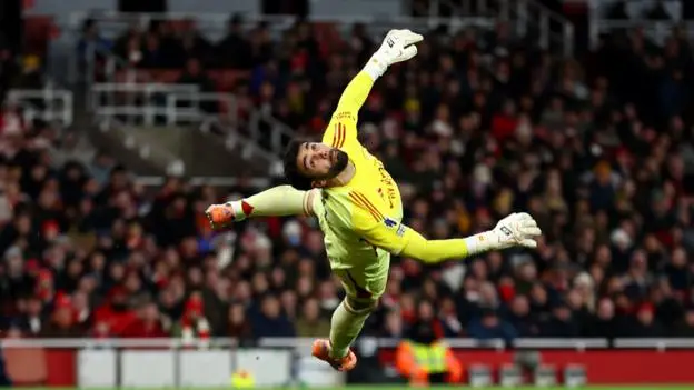 Arsenal in 'survival' mode as 'sensational' Raya save keeps them top